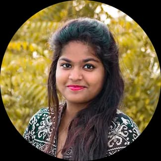 A woman smiling after learning how to lower cholesterol without medication